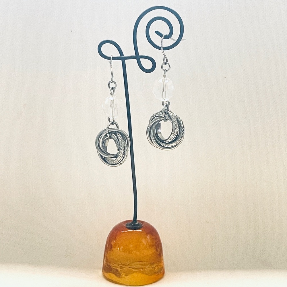 Dangle earrings with clear bead and silver intertwined circles